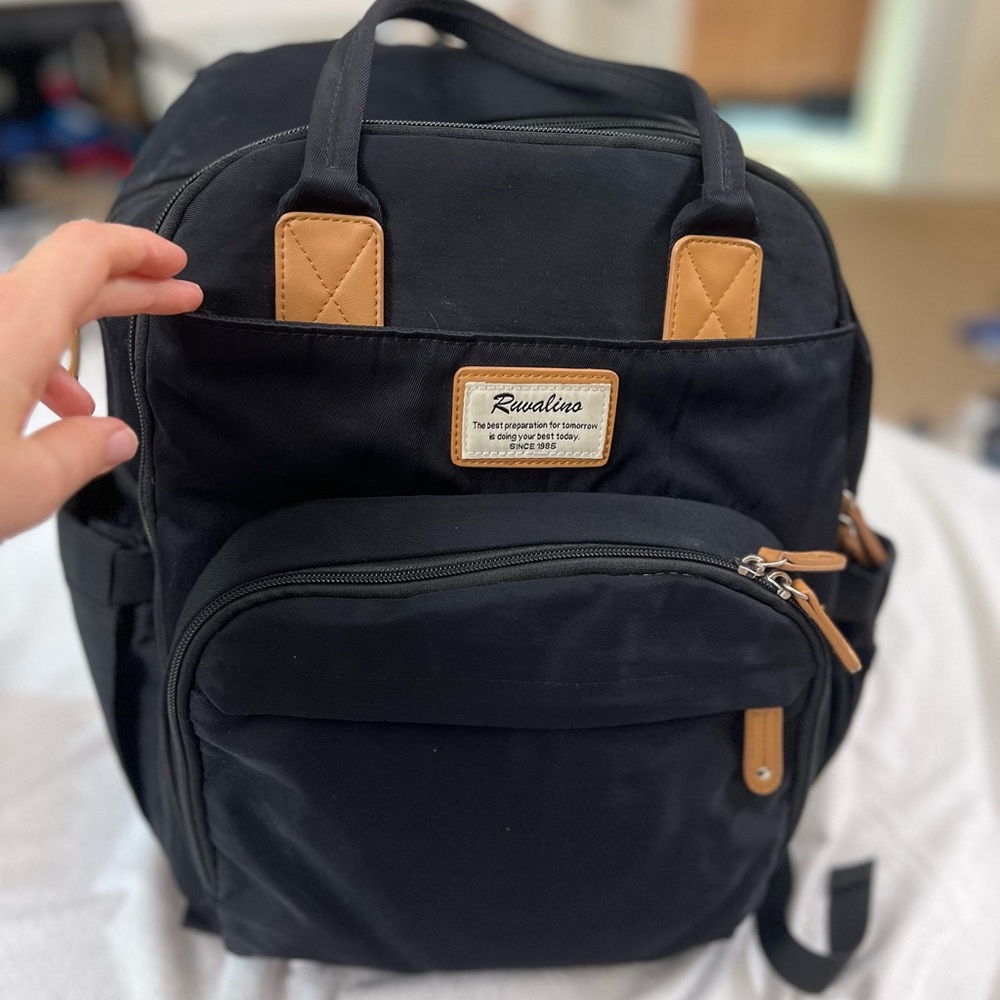 Gently used Ruvalino Diaper Bag. I really loved it. Fit everything.